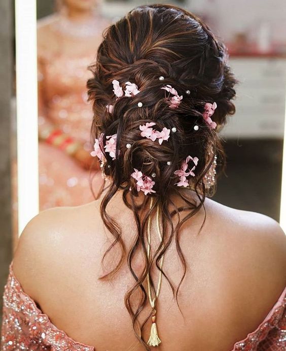 Accessorized Floral Bun Bridesmaid Hairstyle
